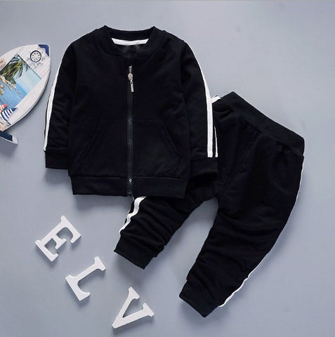 Buzo completo unisex, color negro con líneas blancas 100% algodón