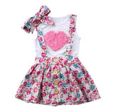 Hermoso conjunto floral  pink falda y polera + cintillo