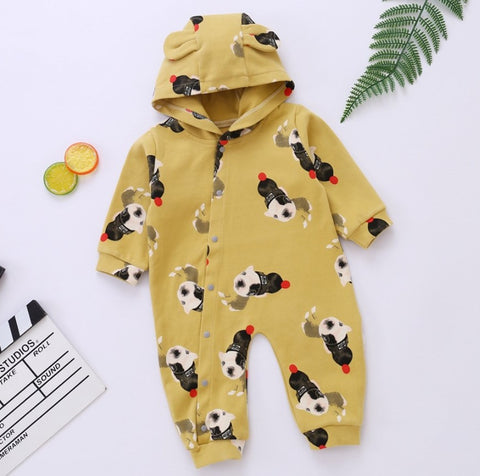 Enterito amarillo unisex con original diseño de perritos 100% algodón