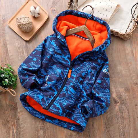 Chaqueta unisex softshell azul forrada es su interior de polar naranjo