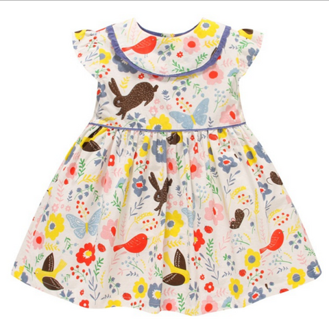 Vestido exclusivo, preciosa caída, colores y diseño con pajaritos, flores y conejos
