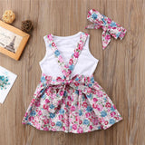 Hermoso conjunto floral  pink falda y polera + cintillo