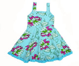 Vestido elegante y precioso, turqueza con flores grandes
