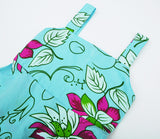 Vestido elegante y precioso, turqueza con flores grandes