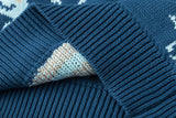 Sweater azul de lana con diseño dinosaurios