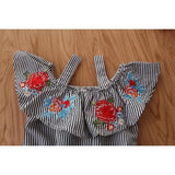 Bello y cómodo enterito hombros descubiertos con flores bordadas